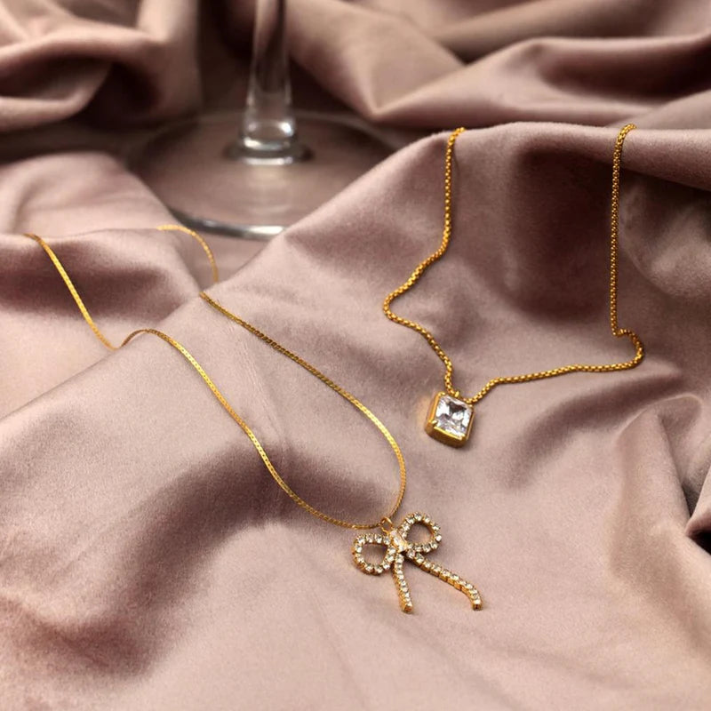 Orelia - Crystal Bow Drop Necklace