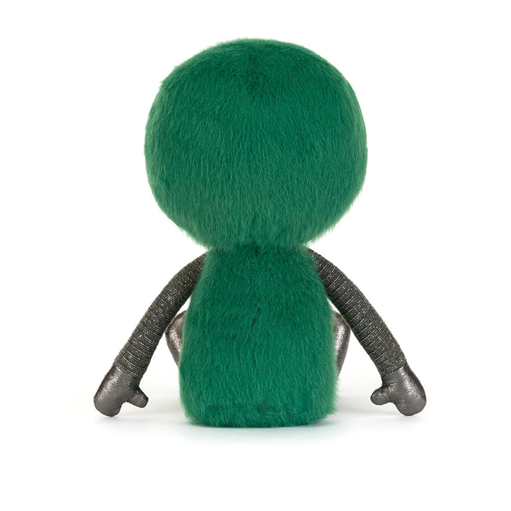 Rear view of Jellycat Zyllan Alien showing its green plush head and body with textured silver arms.